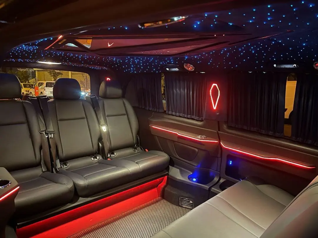 VIP van cabin with a starlight roof, curtains and red ambient lighting