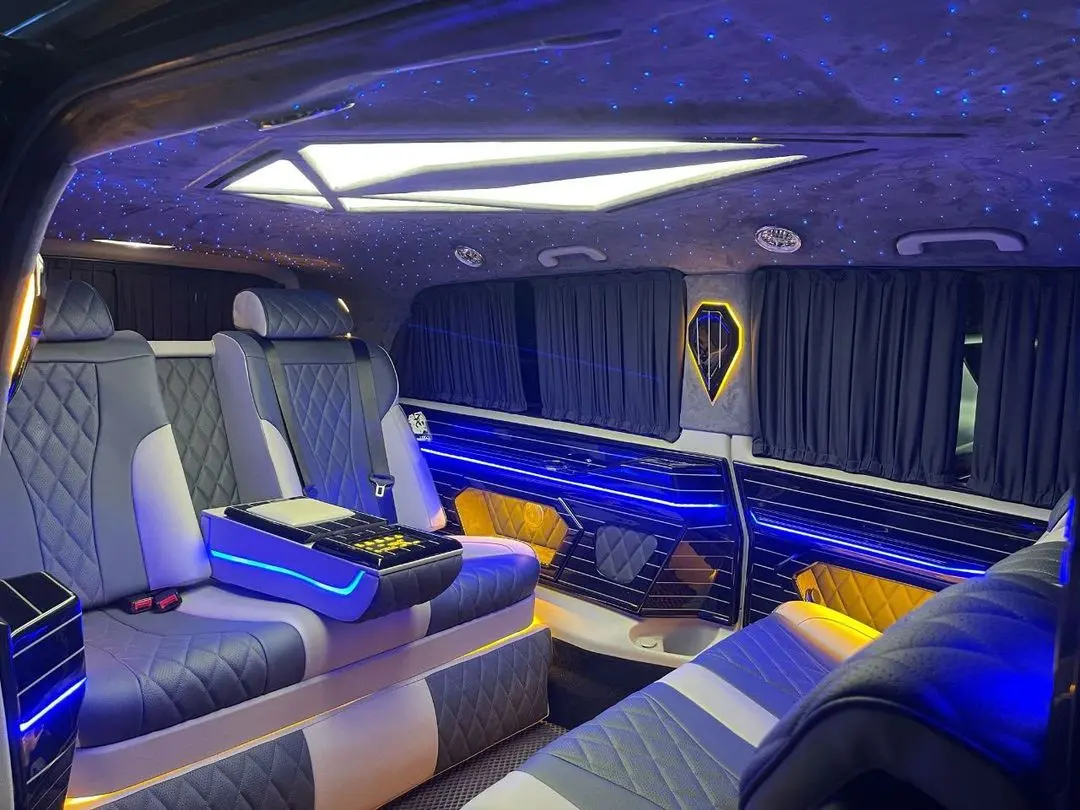 Ultra luxury VIP cabin with quilted lounge seats, centre console and starlight roof