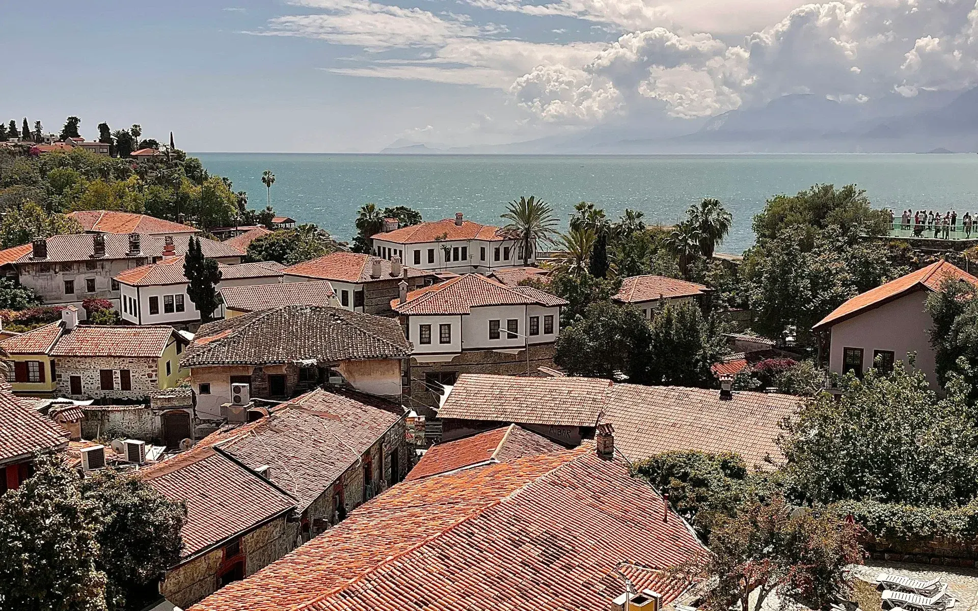 Red-tiled roofs of Antalya's old town above the sea