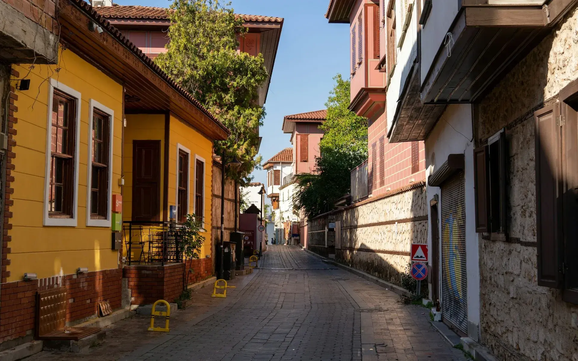 Ottoman-era wooden houses on a narrow Kaleiçi street