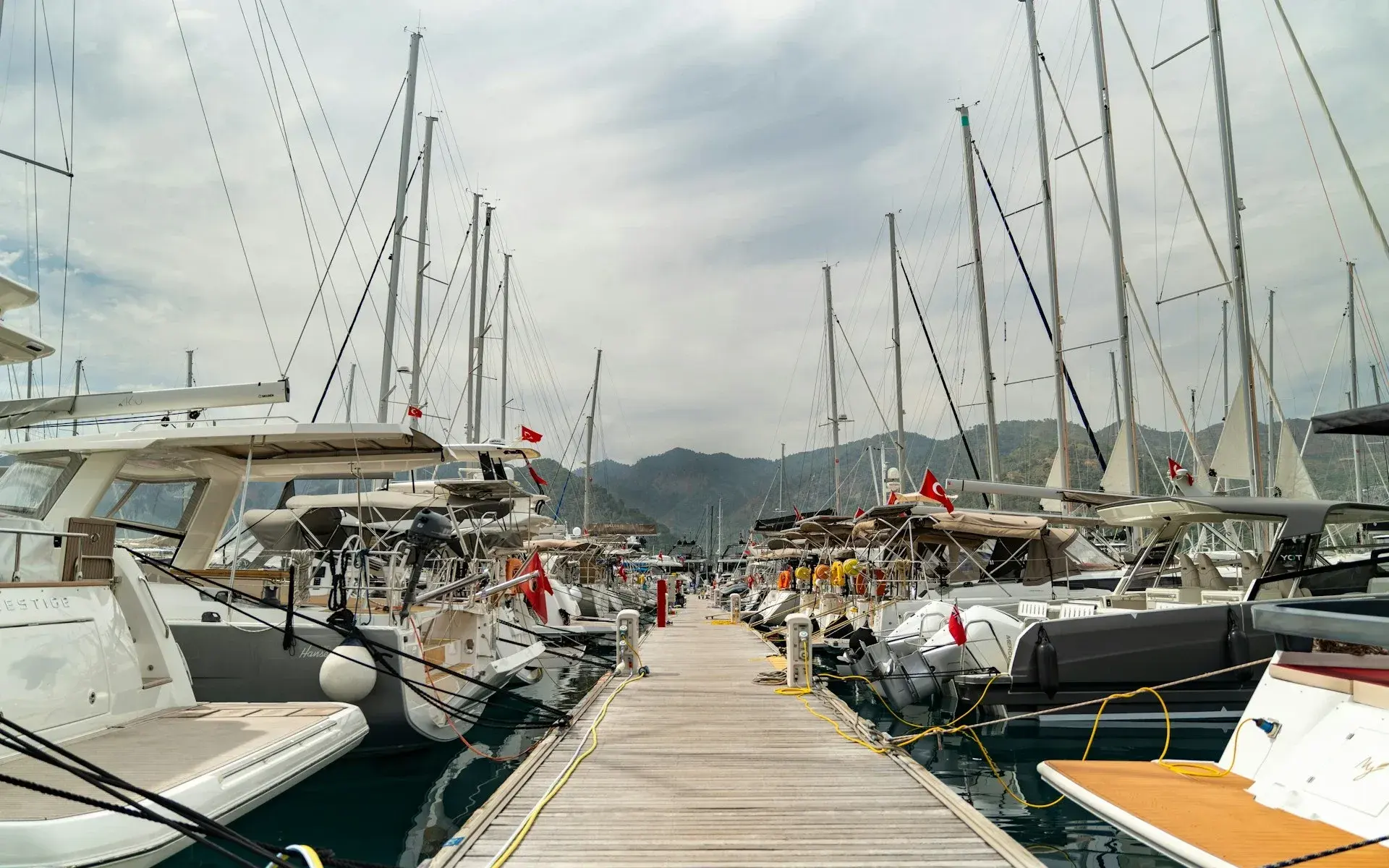 Yachts lined up along a Bodrum marina pier