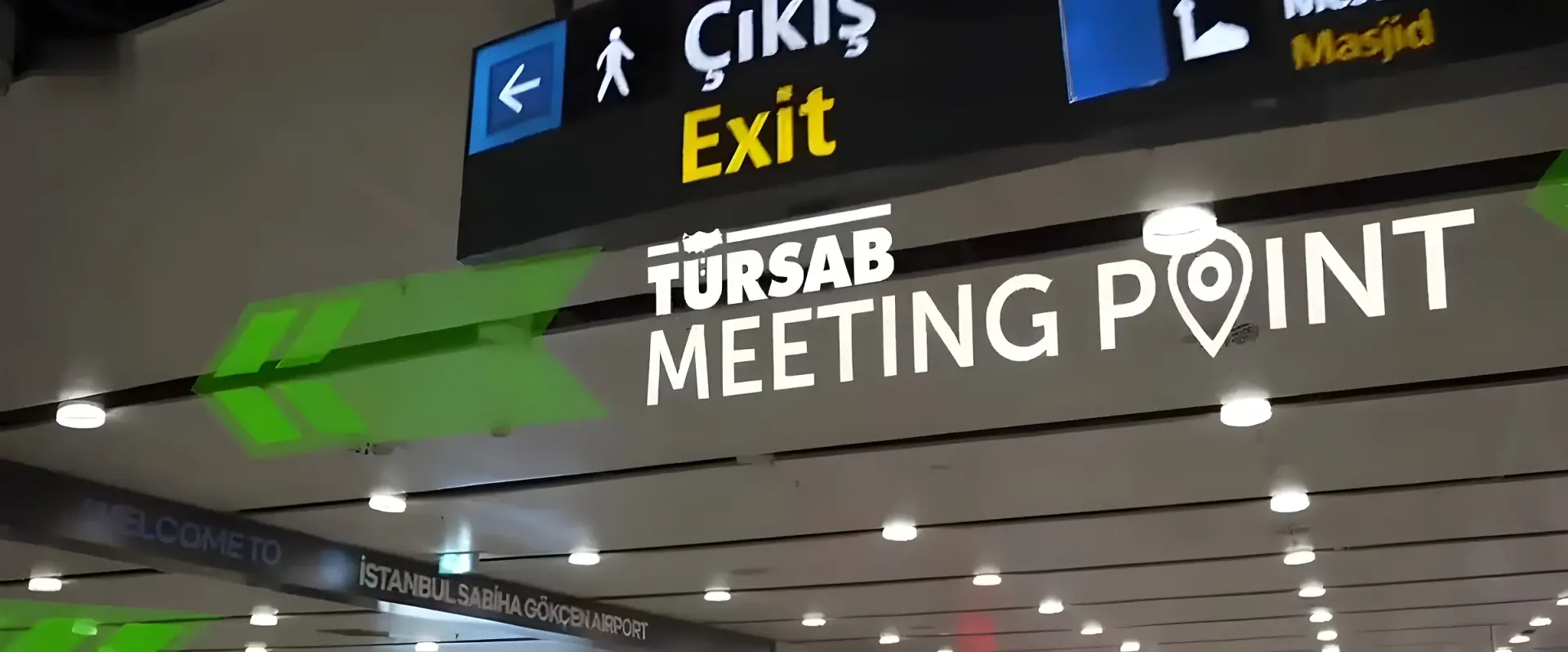 Çıkış / Exit signs in the arrivals hall at Istanbul airport