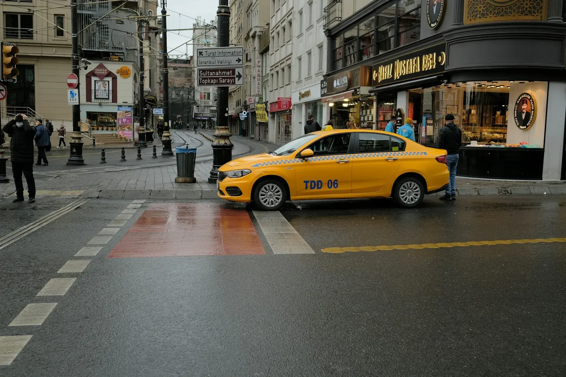VIP transfer van next to an Istanbul taxi comparison