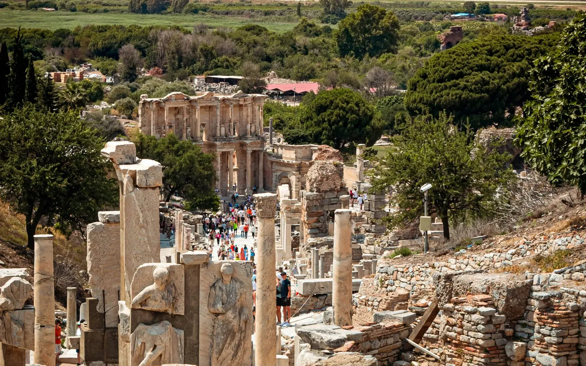 Curetes Street in Ephesus sloping down past columns and statues to the Library of Celsus