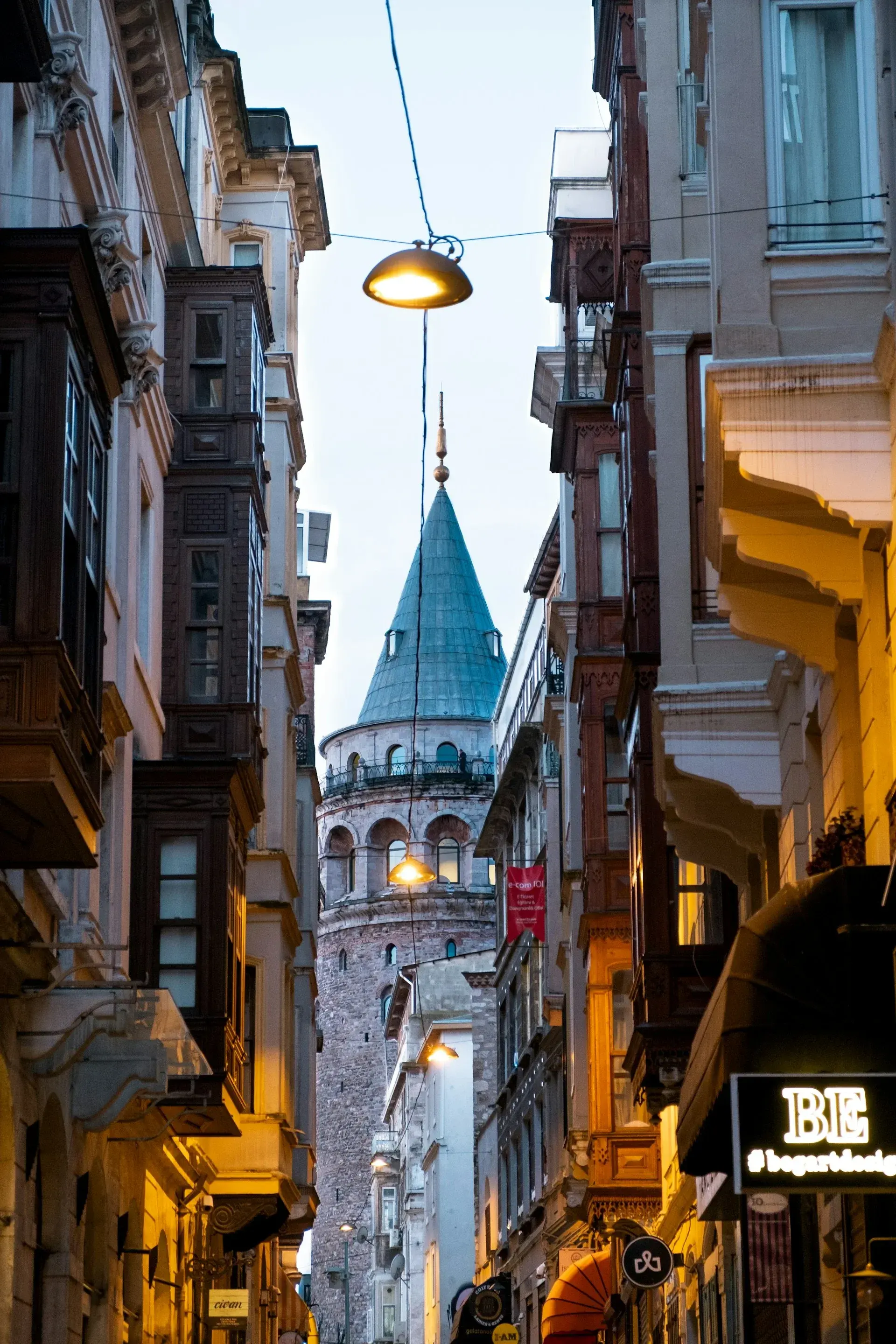 Galata Tower rising between apartment buildings in Beyoğlu