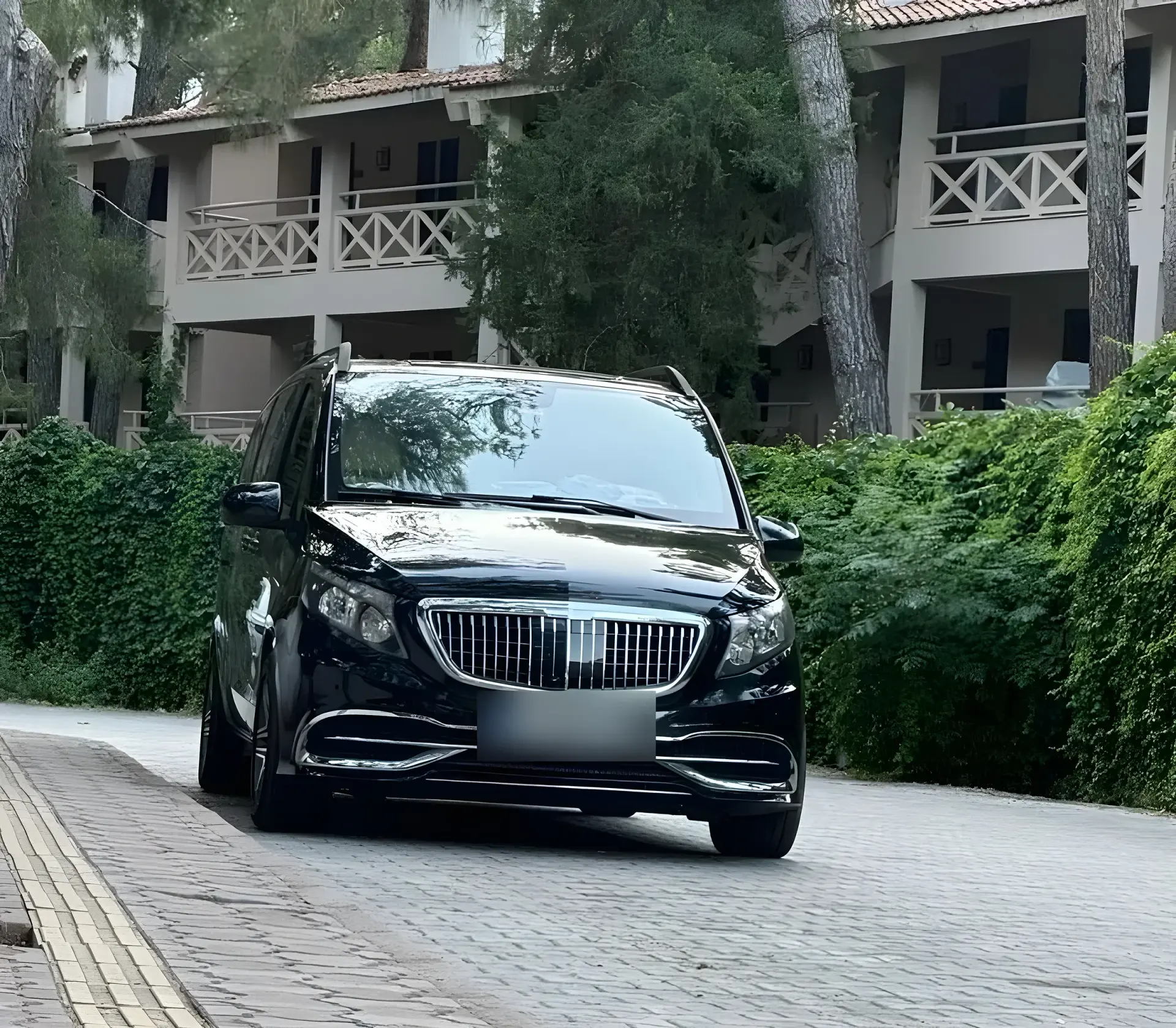 Black Mercedes VIP van on a hotel drive